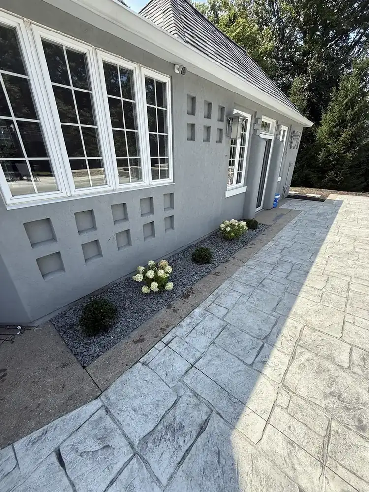 Decorative rock bed along a walkway
